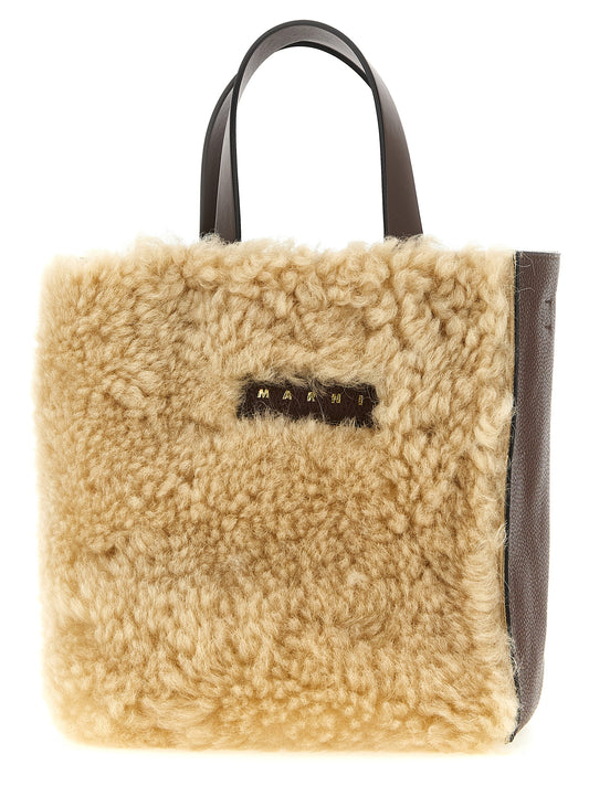 Mni Tote Handbag by Marni for women in polyester & cotton brown, cream, gold, multicolor & signature presents a ornamental silhouette, showcasing a secure zipper, ample , and versatile shoulder-strap & detachable-strap for a ornamental finish.