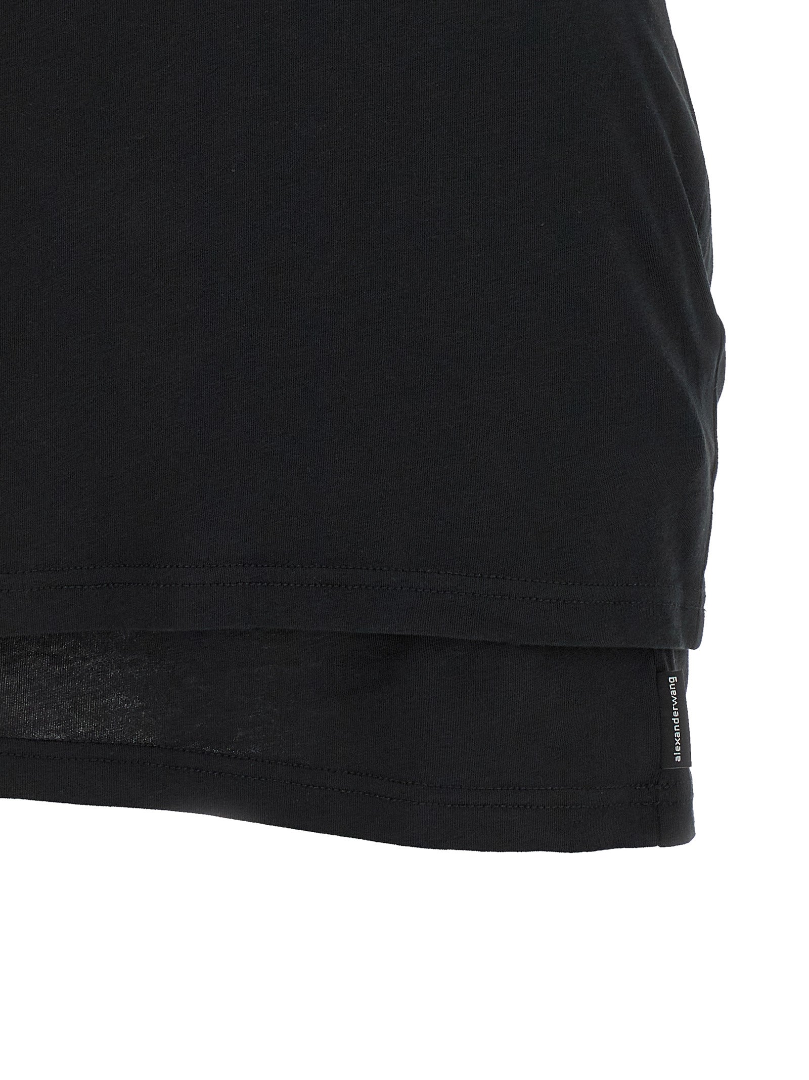 Dress by Alexander Wang for women in stretch cotton black features a dramatic silhouette, showcasing an elegant and that flows into a dramatic short.