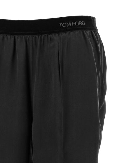 Pajamas by Tom Ford for women in silk black features an plush silhouette, showcasing the plush design of the Women's Silk Pajamas for a sophisticated look.
