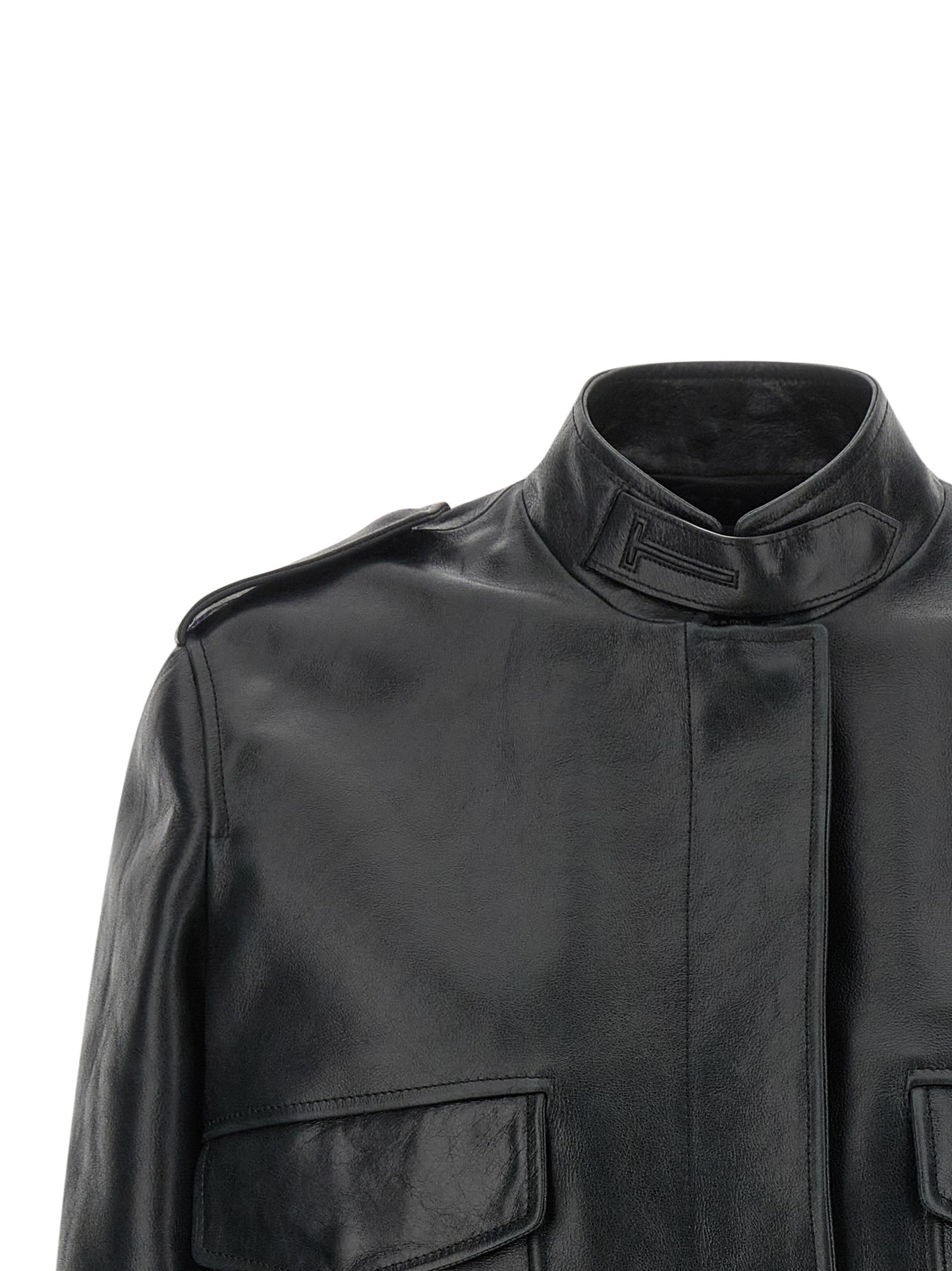 This Jacket by Tom Ford for women in lamb leather black & natural showcases a magnificent silhouette, meticulously crafted with a distinctive and functional pockets for a magnificent finish.