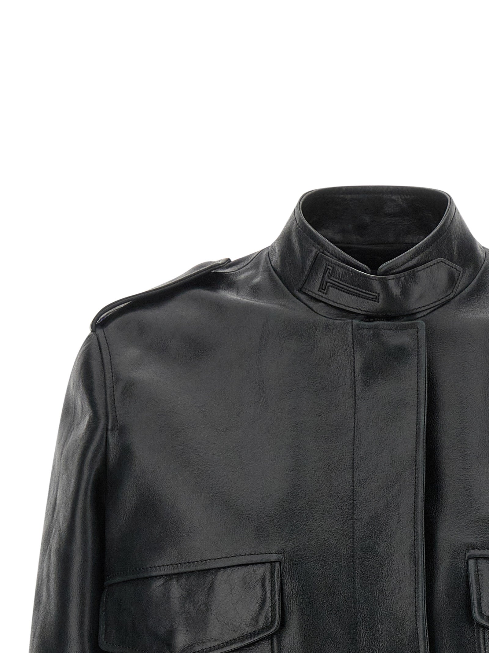 This Jacket by Tom Ford for women in lamb leather black & natural showcases a magnificent silhouette, meticulously crafted with a distinctive and functional pockets for a magnificent finish.