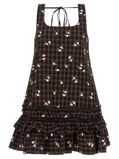 Dress by Ganni for women in organic cotton brown, patterned & floral features an cute silhouette, detailed with a and that elegantly flows into a cute short mini.