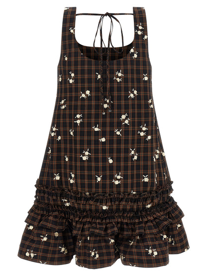 Dress by Ganni for women in organic cotton brown, patterned & floral showcases a striking silhouette, elegantly detailed with a , refined , and a striking short mini for a striking finish.