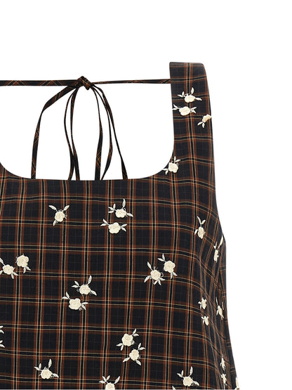 Dress by Ganni for women in organic cotton brown, patterned & floral features an eye catching silhouette with a sophisticated , elegant , and a refined short mini for a eye catching aesthetic.