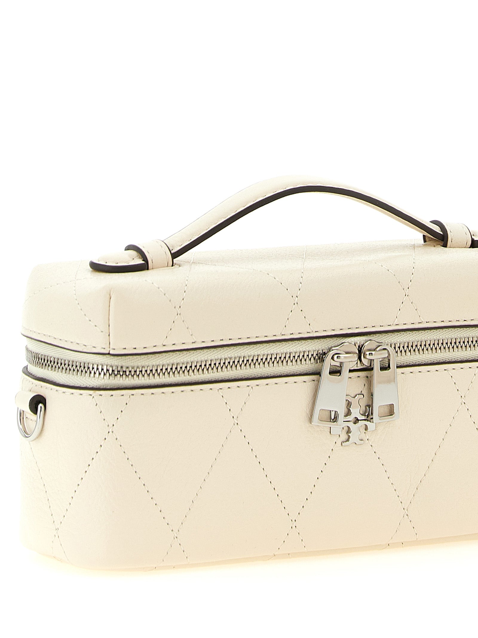 Crossbody Quilted Vanity Handbag by Tory Burch for women in leather cream, silver, white & signature features a transformative sophistication silhouette, showcasing a secure zipper, ample built-in-compartments & cardholder, and versatile crossbody-strap, shoulder-strap, handle & detachable-strap for a transformative sophistication look.
