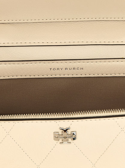 Crossbody Quilted Vanity Handbag by Tory Burch for women in leather cream, silver, white & signature features an versatile silhouette, showcasing a secure zipper and versatile built-in-compartments & cardholder with versatile crossbody-strap, shoulder-strap, handle & detachable-strap for a versatile finish.