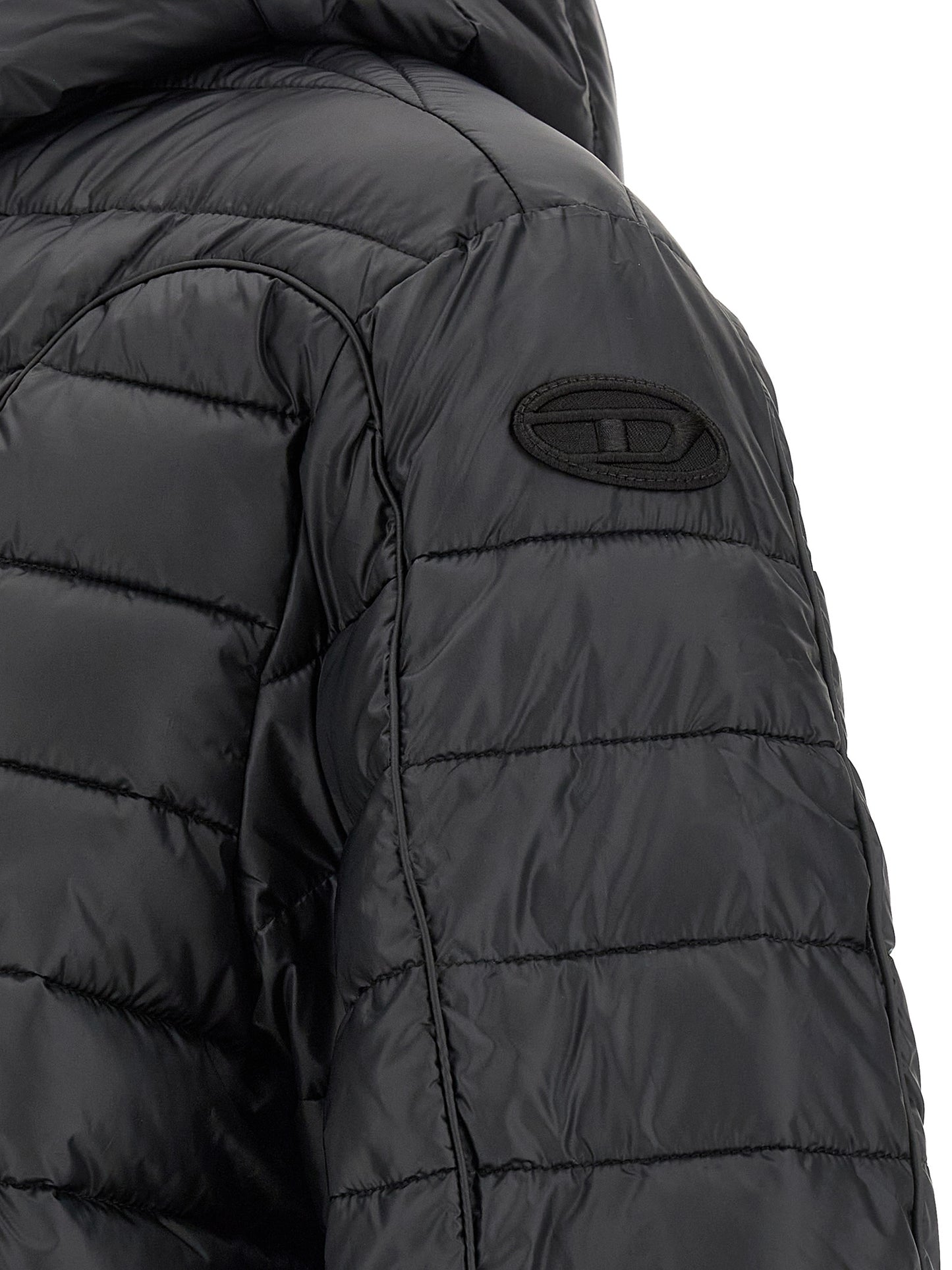 Hooded Puffer Jacket by Diesel for men in polyester black features a dramatic silhouette, showcasing a sophisticated and distinctive lightweight, hooded & insulated for a dramatic aesthetic.