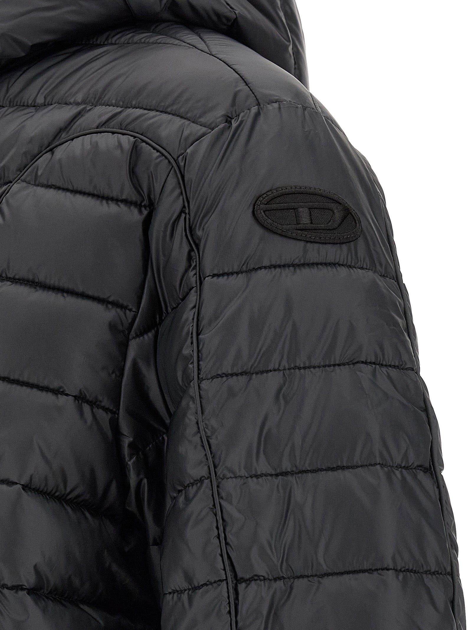 Hooded Puffer Jacket by Diesel for men in polyester black features a dramatic silhouette, showcasing a sophisticated and distinctive lightweight, hooded & insulated for a dramatic aesthetic.
