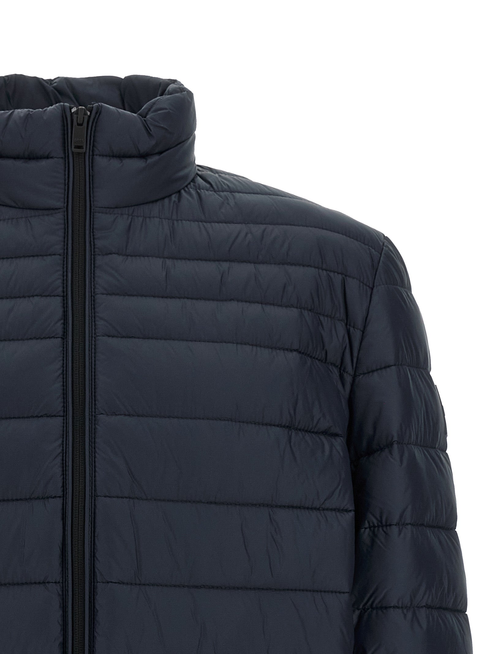 Puffer Jacket by Hugo Boss for men in polyamide navy features a dramatic silhouette, showcasing a sophisticated high-neck neckline and distinctive insulated for a dramatic aesthetic.