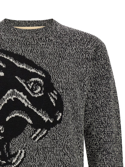 Cardigan by Valentino Garavani for men in virgin wool & cotton bicolour, black & white features a nuanced silhouette with a refined crew neckline and nuanced detailing for a sophisticated look.