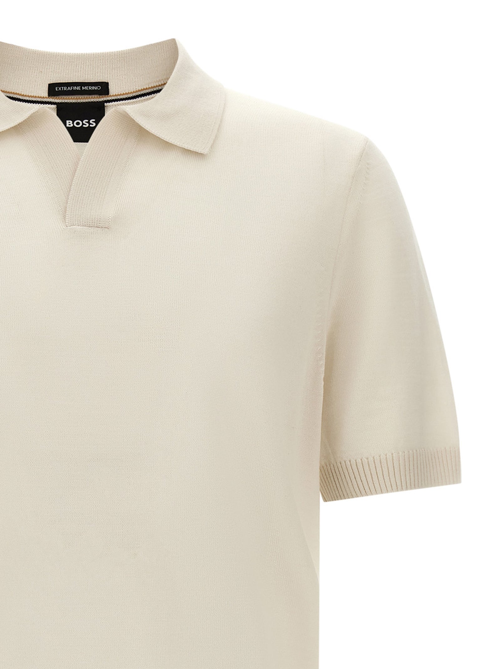 Polo Shirt by Hugo Boss for men in virgin wool black, cream & white presents a sleek silhouette, featuring a refined and for a sleek finish.