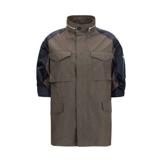 Windbreaker Jacket by Sacai for women in nylon cotton bicolour features an perennial silhouette with a refined high-collar neckline and perennial pockets & windproof for a sophisticated weather-resistant look.