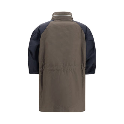 Windbreaker Jacket by Sacai for women in nylon cotton bicolour features an magnificent silhouette, showcasing the sophisticated high-collar neckline and functional pockets & windproof for a premium, magnificent look.