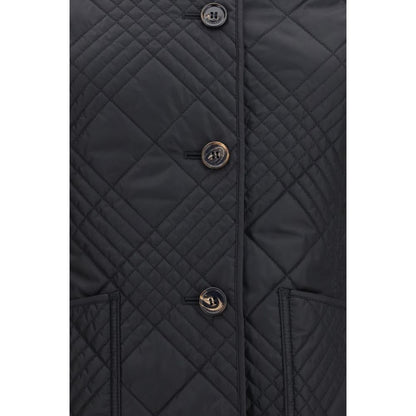 Overcoat by Burberry for women in nylon leather beige, black, sand, patterned & signature showcases a architectural silhouette, artfully detailed with a distinctive and functional lightweight for a architectural finish.