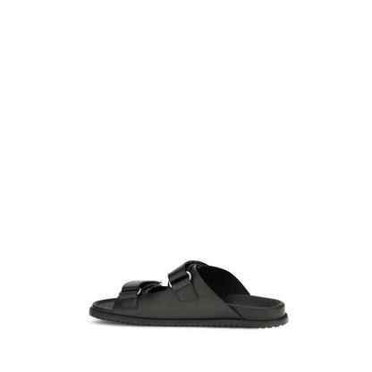 Flat Sandals by Dolce & Gabbana for men in eva polyurethane & bos taurus calfskin leather black & signature features an effortlessly chic silhouette from the Men's EVA Polyurethane & Bos Taurus Calfskin Leather Flat Sandals collection, showcasing a effortlessly chic flat and elegant .