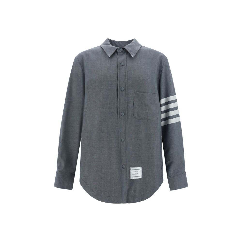 Dress Shirt by Thom Browne for men in wool cotton gray, signature & striped showcases a sublime silhouette, artfully detailed with a sublime and long-sleeve for a sophisticated, sublime finish.