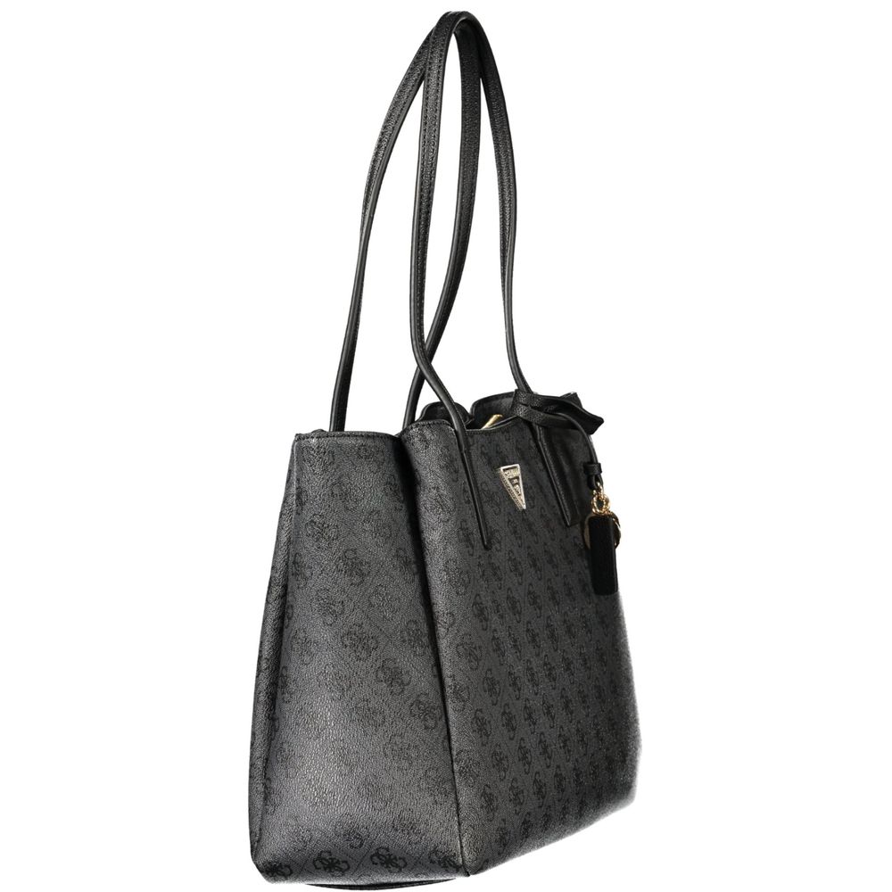 This Handbag by Guess Jeans for women in polyurethane and black presents a sculptural silhouette featuring a secure , ample built-in-compartments & laptop-compartment, and versatile handle for a sculptural finish.