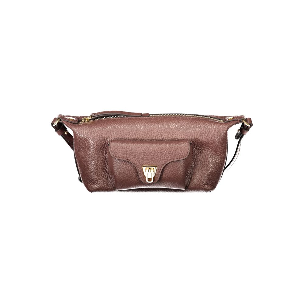 Handbag by Coccinelle for women in leather brown & signature features a ornamental silhouette, showcasing a secure zipper, ample external-pockets, and ornamental shoulder-strap & adjustable-strap for a sophisticated look.