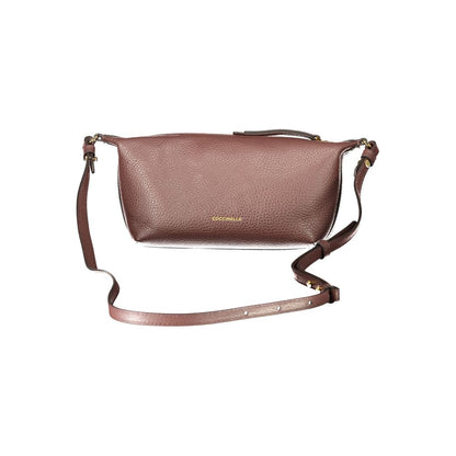 Handbag by Coccinelle for women in leather brown & signature features a signature silhouette, showcasing a secure zipper and signature external-pockets with versatile shoulder-strap & adjustable-strap for a sophisticated look.
