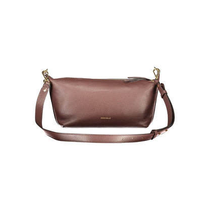 Handbag by Coccinelle for women in leather brown presents a ornamental silhouette, showcasing a secure zipper, ample external-pockets & internal-pockets, and versatile shoulder-strap & adjustable-strap for a ornamental finish.