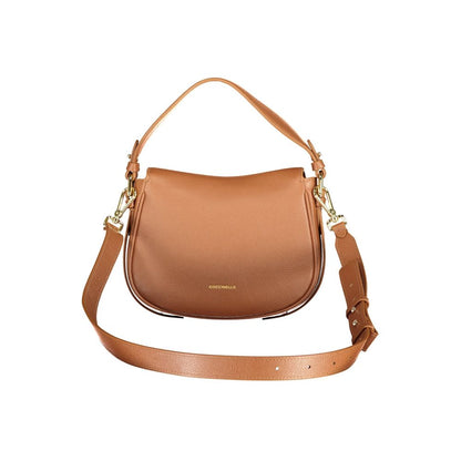Handbag by Coccinelle for women in leather brown features a signature silhouette, showcasing a secure magnetic and signature built-in-compartments with versatile shoulder-strap, handle, adjustable-strap & detachable-strap for a sophisticated look.
