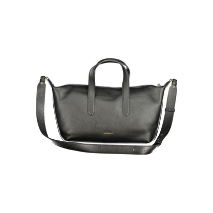 Handbag by Coccinelle for women in leather black, signature-print & print presents a ornamental silhouette, showcasing a secure zipper, ample document-holder, external-pockets & internal-pockets, and versatile shoulder-strap, handle & adjustable-strap for a ornamental finish.