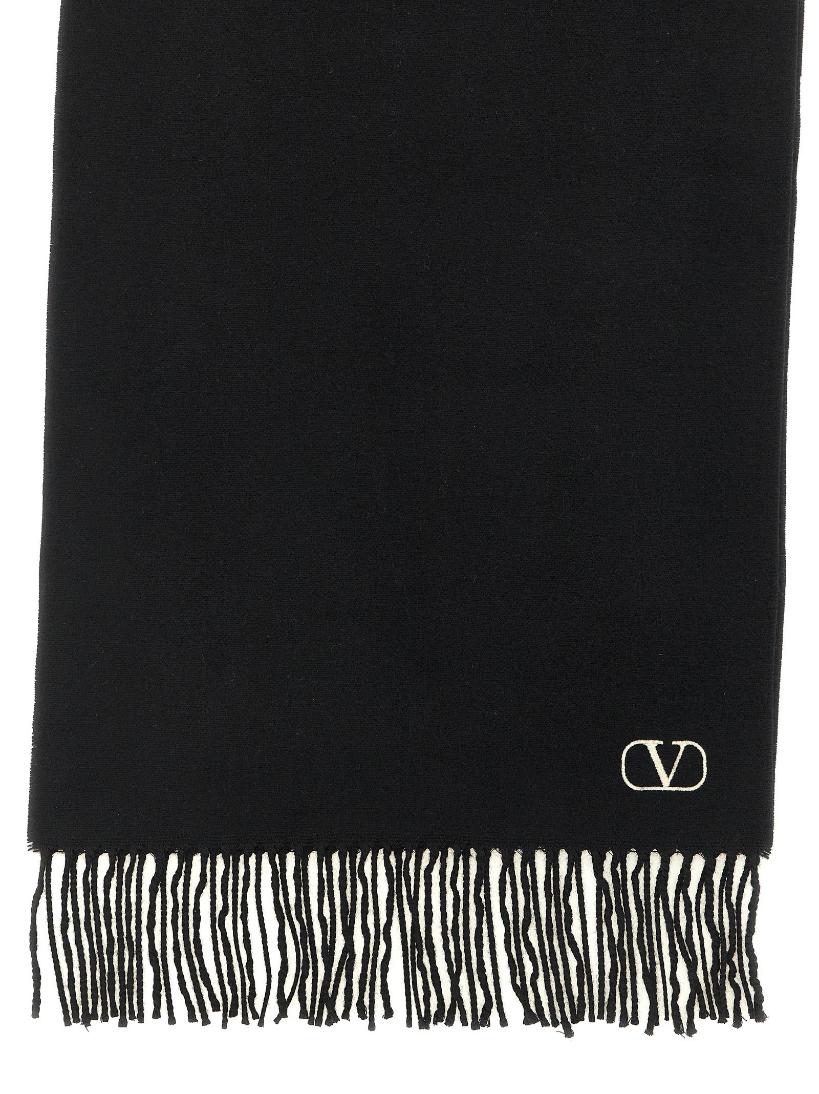 Scarf by Valentino Garavani for men in cashmere bicolour, black, white & signature showcases a warm silhouette from the Icon V Logo Cashmere Shawl Stole Fringes Scarf collection, offering a warm drape that exudes sophisticated luxury.