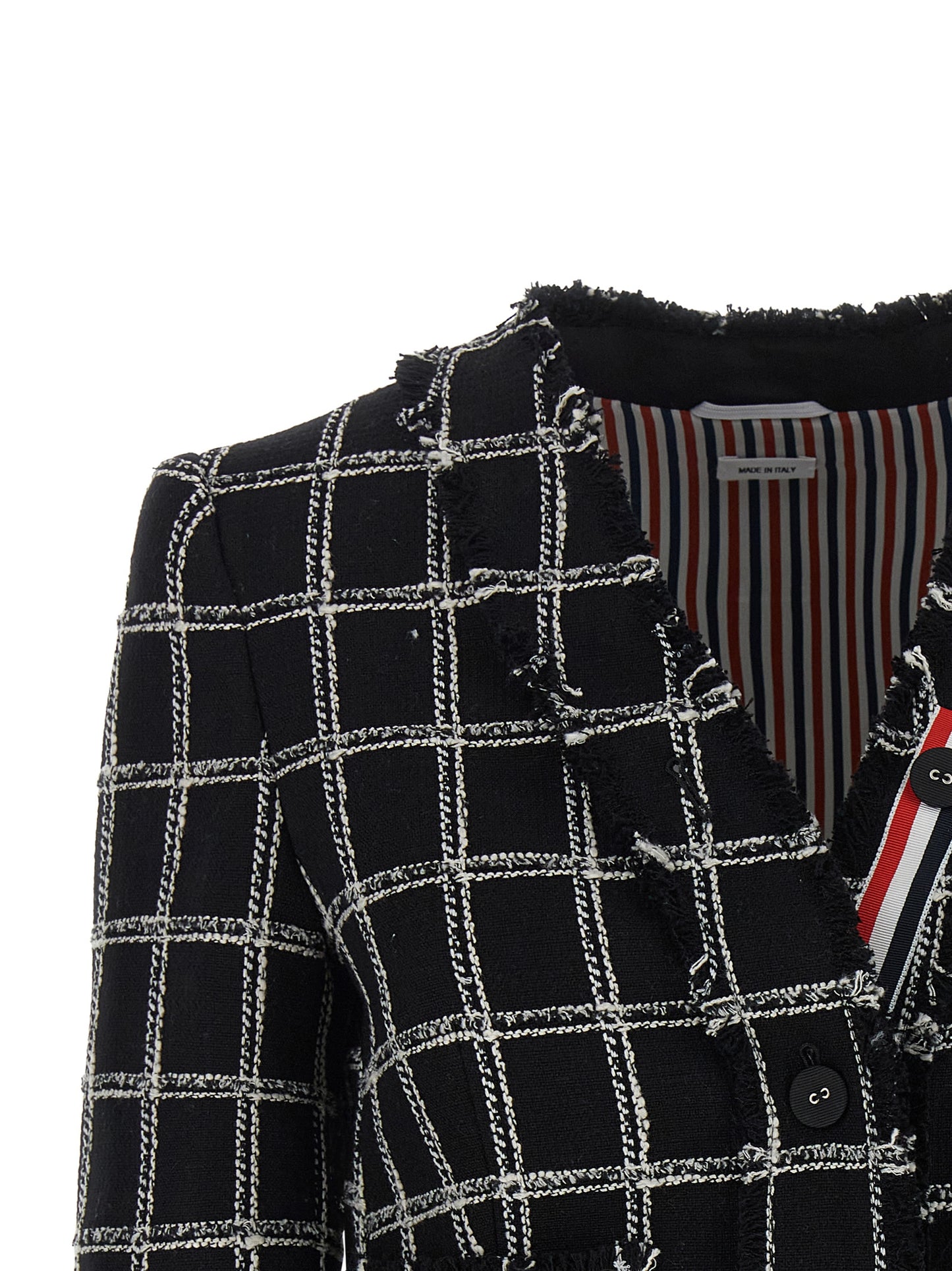 This Blazer by Thom Browne for women in polyester cotton wool multicolor, patterned & striped presents a tailored silhouette, meticulously tailored with a tailored v-neck neckline and distinctive for a tailored finish.