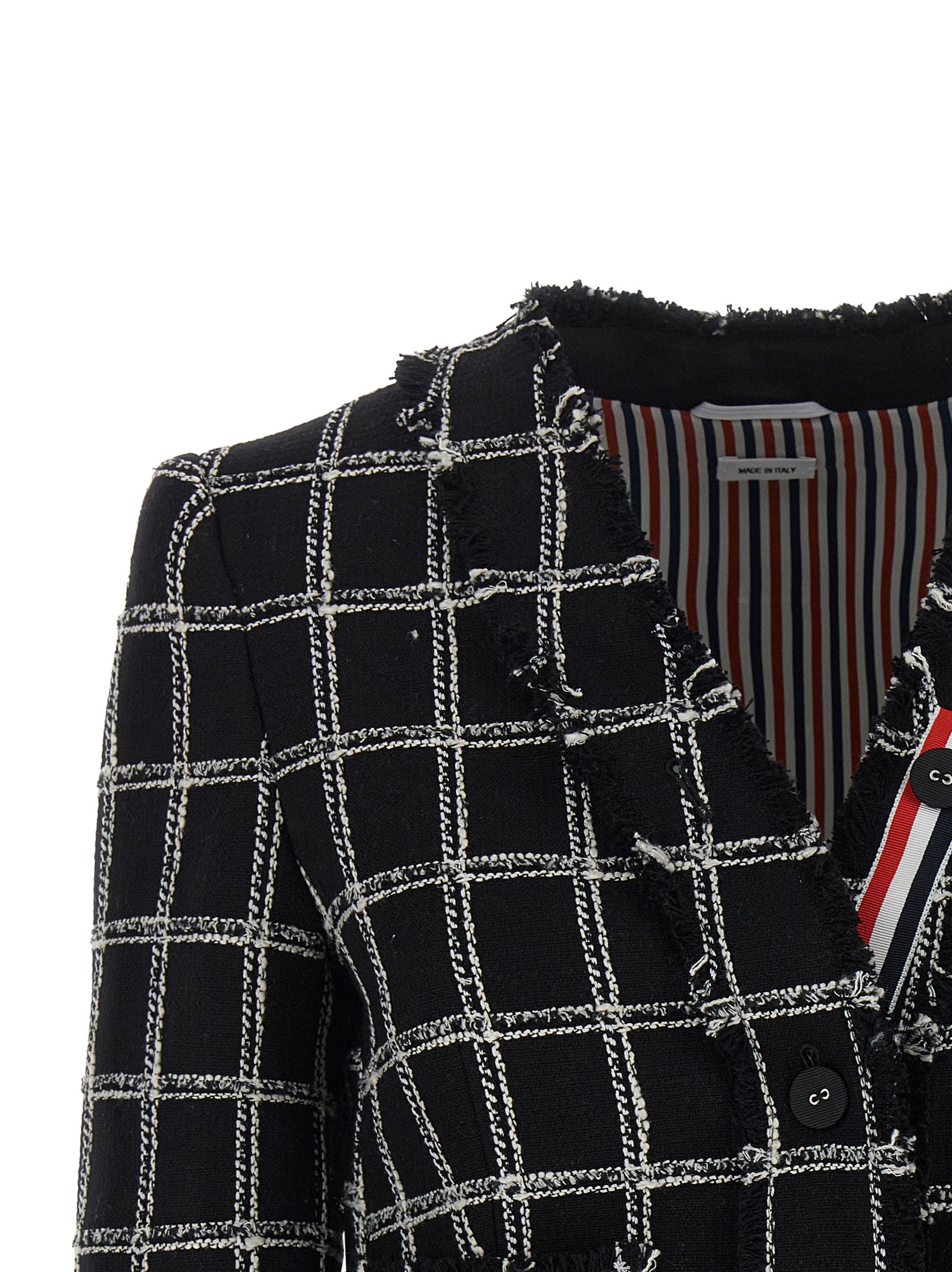 This Blazer by Thom Browne for women in polyester cotton wool multicolor, patterned & striped presents a tailored silhouette, meticulously tailored with a tailored v-neck neckline and distinctive for a tailored finish.