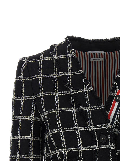 This Blazer by Thom Browne for women in polyester cotton wool multicolor, patterned & striped presents a tailored silhouette, meticulously tailored with a tailored v-neck neckline and distinctive for a tailored finish.