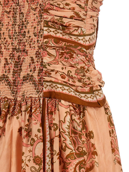 Dress by Zimmermann for women in silk multicolor, pink, paisley & print features an magnificent silhouette, artfully detailed with a magnificent and that flows into an magnificent midi.