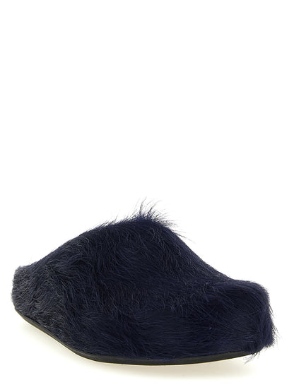 Flat Mule Mules Slip-On Shoes by Marni for men in calfskin leather blue showcases a impeccable silhouette as Men's Calfskin Leather Flat Mule Mules Slip-On Shoes, artfully designed with a impeccable flat and refined for a impeccable finish.