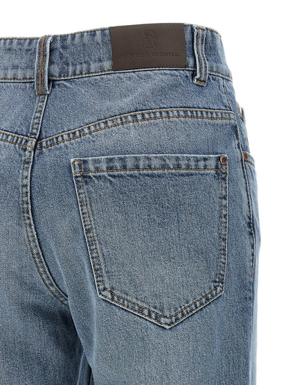 Jeans by Brunello Cucinelli for women in stretch cotton denim & leather blue, brown & copper features a refined silhouette with a refined straight-leg, relaxed-fit & cropped, defined by a and a refined cropped for a refined finish.