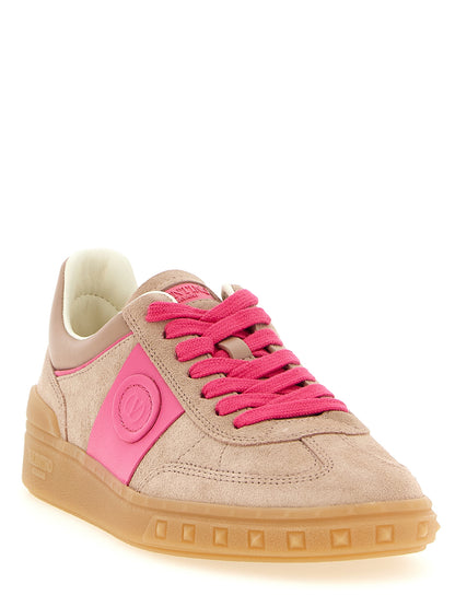 Sneakers by Valentino Garavani for women in nappa & suede calfskin leather multicolor, natural & pink features a chic design, perfectly showcasing the chic low-top style of this Rockstud V Logo Women's Low Top Nappa & Suede Calfskin Leather Sneakers.