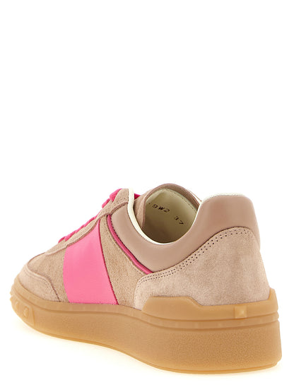 Sneakers by Valentino Garavani for women in nappa & suede calfskin leather multicolor, natural & pink presents a on trend silhouette from the Rockstud V Logo Women's Low Top Nappa & Suede Calfskin Leather Sneakers collection, showcasing a on trend low-top style for an elevated aesthetic.