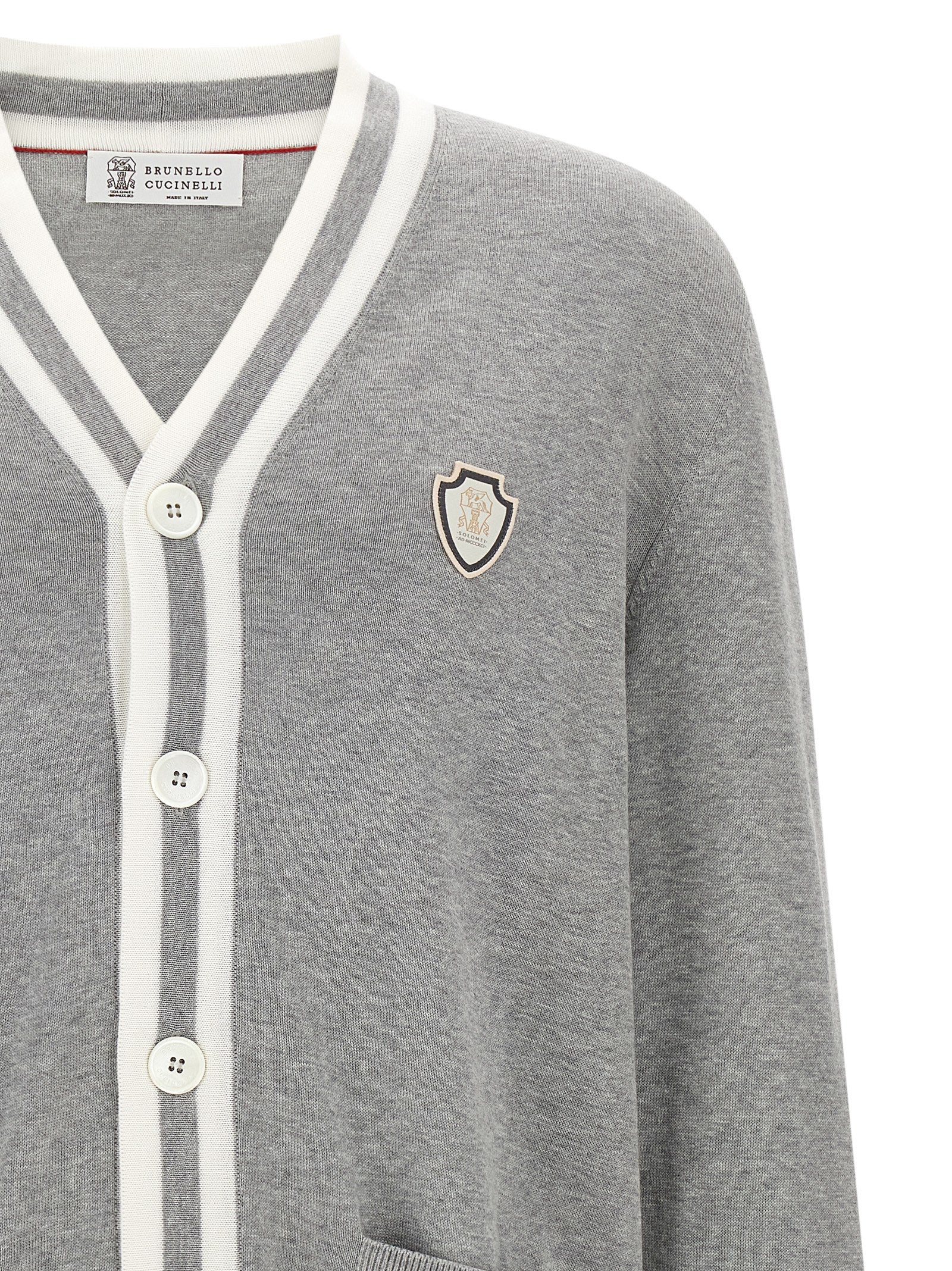 Cardigan by Brunello Cucinelli for men in cotton gray, pearl & white features an impeccable silhouette, showcasing a sophisticated v-neck neckline and detail for a truly impeccable finish.