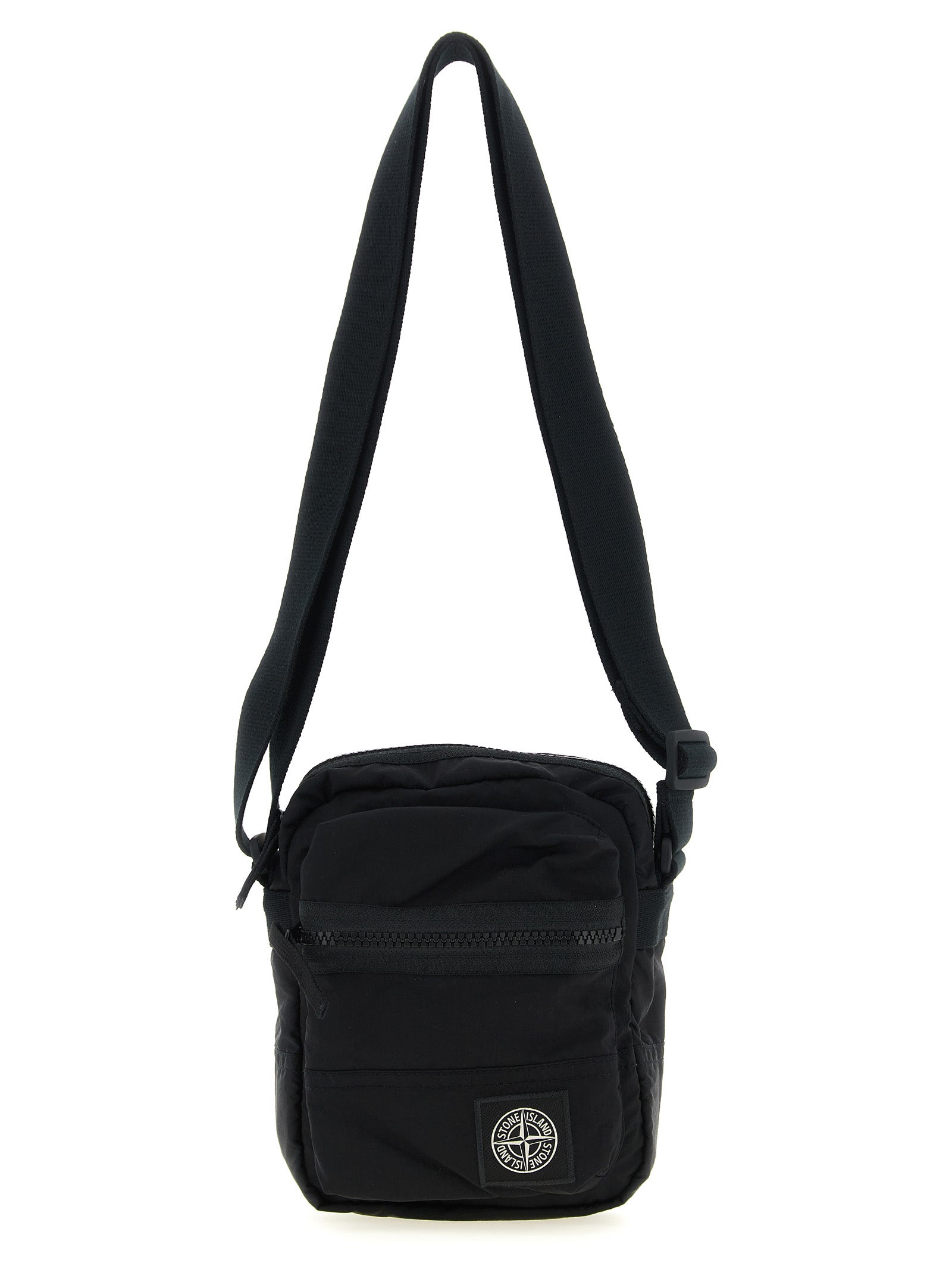 Compact Crossbody Messenger Bag by Stone Island for men in nylon black features a distinguished Nylon Compact Crossbody Messenger Bag design with a secure snap, zipper & button, ample , and versatile crossbody-strap & adjustable-strap for a distinguished look.