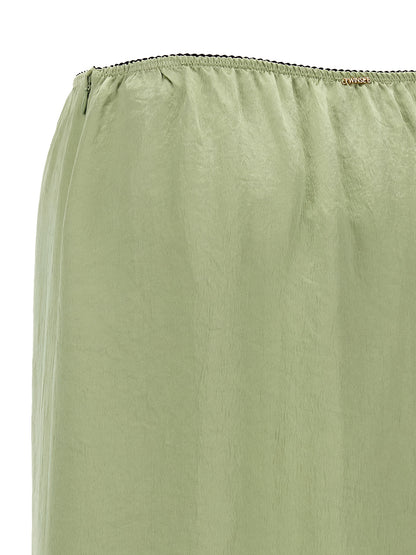 Skirt by Twinset for women in marabou acrylic satin bicolour, black & green showcases a dramatic silhouette, artfully capturing the essence of the Grace Women's Marabou Acrylic Satin Skirt in a dramatic midi cut for a refined look.