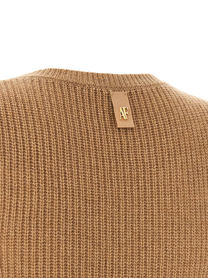 Dress by Alberta Ferretti for women in cashmere & acrylic fiber brown, camel, gold, white, floral & signature features a dramatic silhouette, showcasing an elegant and that flows into a dramatic midi short.