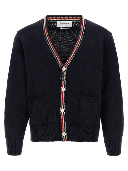 Cardigan by Thom Browne for men in mohair wool navy & striped features an impeccable silhouette, showcasing a sophisticated v-neck neckline and detail for a truly impeccable finish.