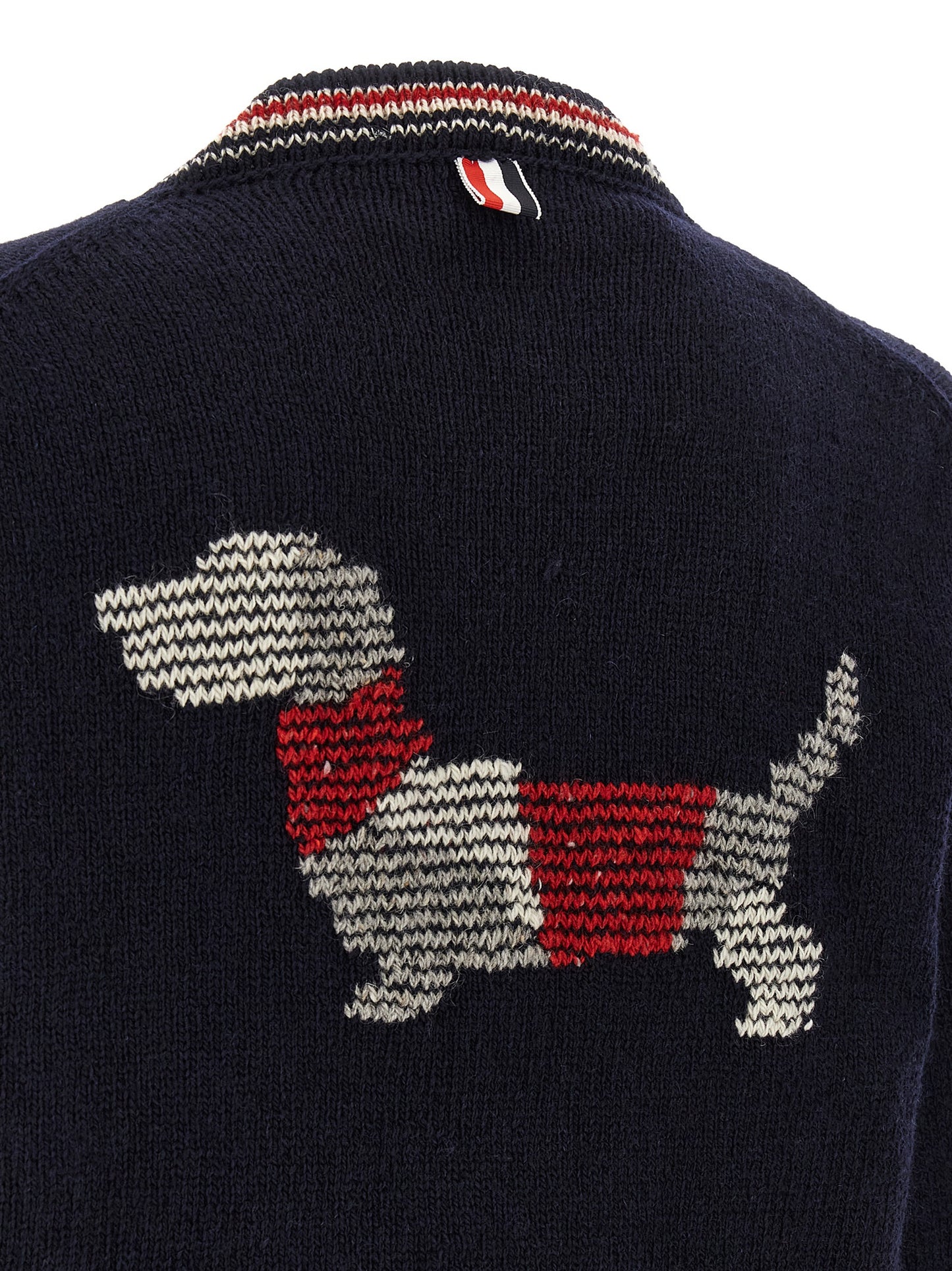 Cardigan by Thom Browne for men in mohair wool navy & striped features an impeccable silhouette, showcasing a sophisticated and detail for a truly impeccable finish.