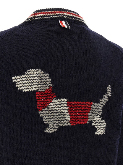 Cardigan by Thom Browne for men in mohair wool navy & striped features an impeccable silhouette, showcasing a sophisticated and detail for a truly impeccable finish.