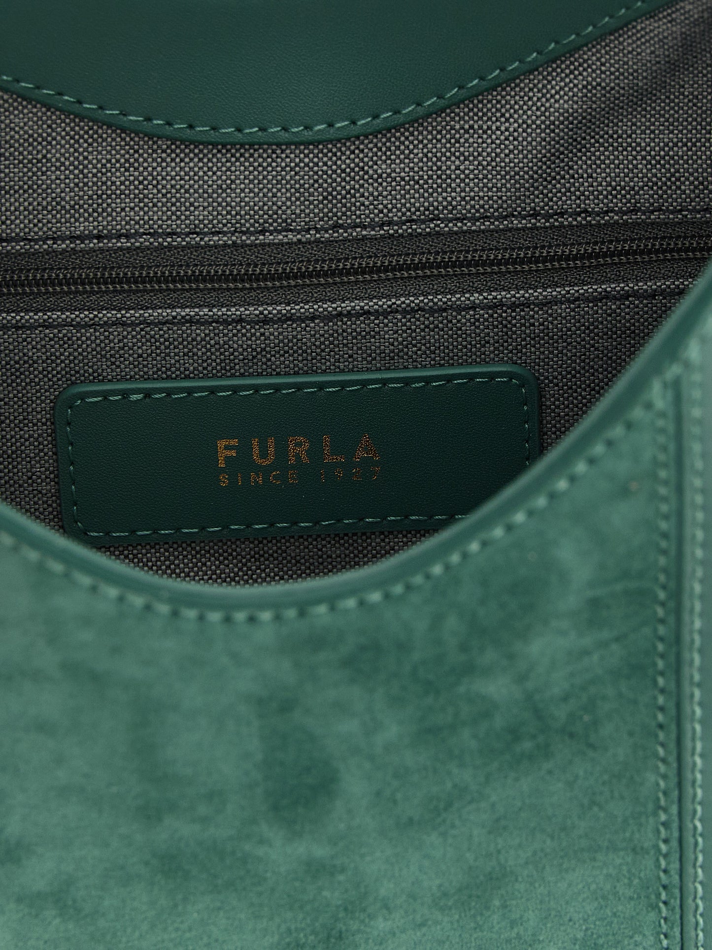 Hobo Shoulder Bag by Furla for women in suede calfskin leather bicolour & green showcases a enviable silhouette, artfully detailed with a secure , organized , and versatile adjustable-strap & handle for a enviable look.