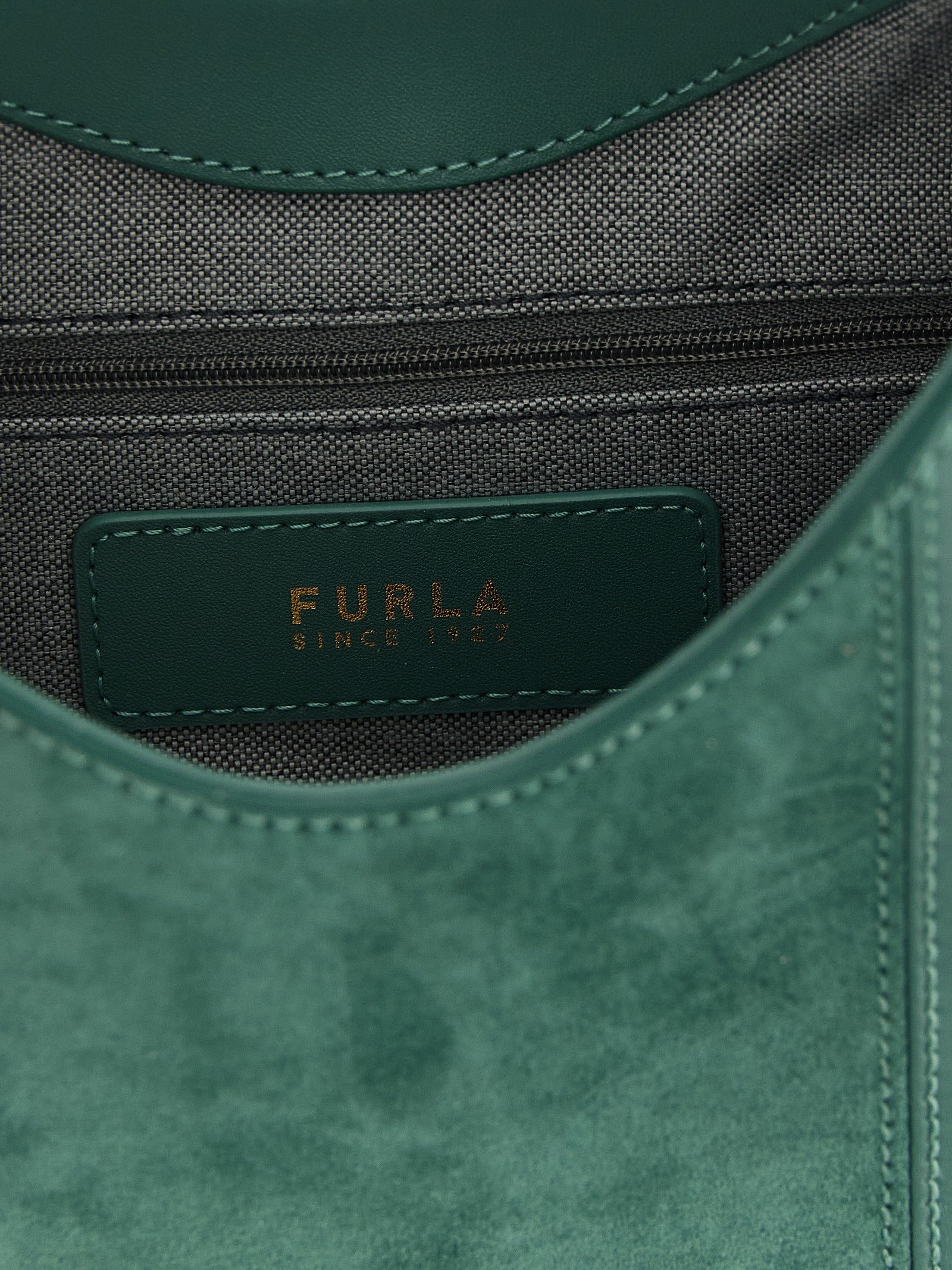 Hobo Shoulder Bag by Furla for women in suede calfskin leather bicolour & green showcases a enviable silhouette, artfully detailed with a secure , organized , and versatile adjustable-strap & handle for a enviable look.