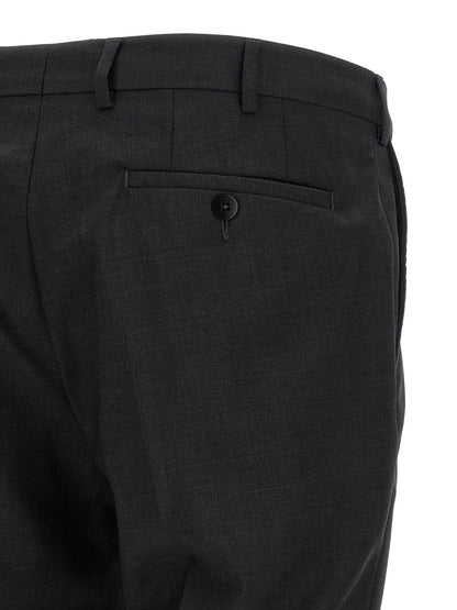 This Pant Suit by Pal Zileri for men in wool gray presents a discerning silhouette, featuring a sophisticated and a discerning for a refined and polished look.