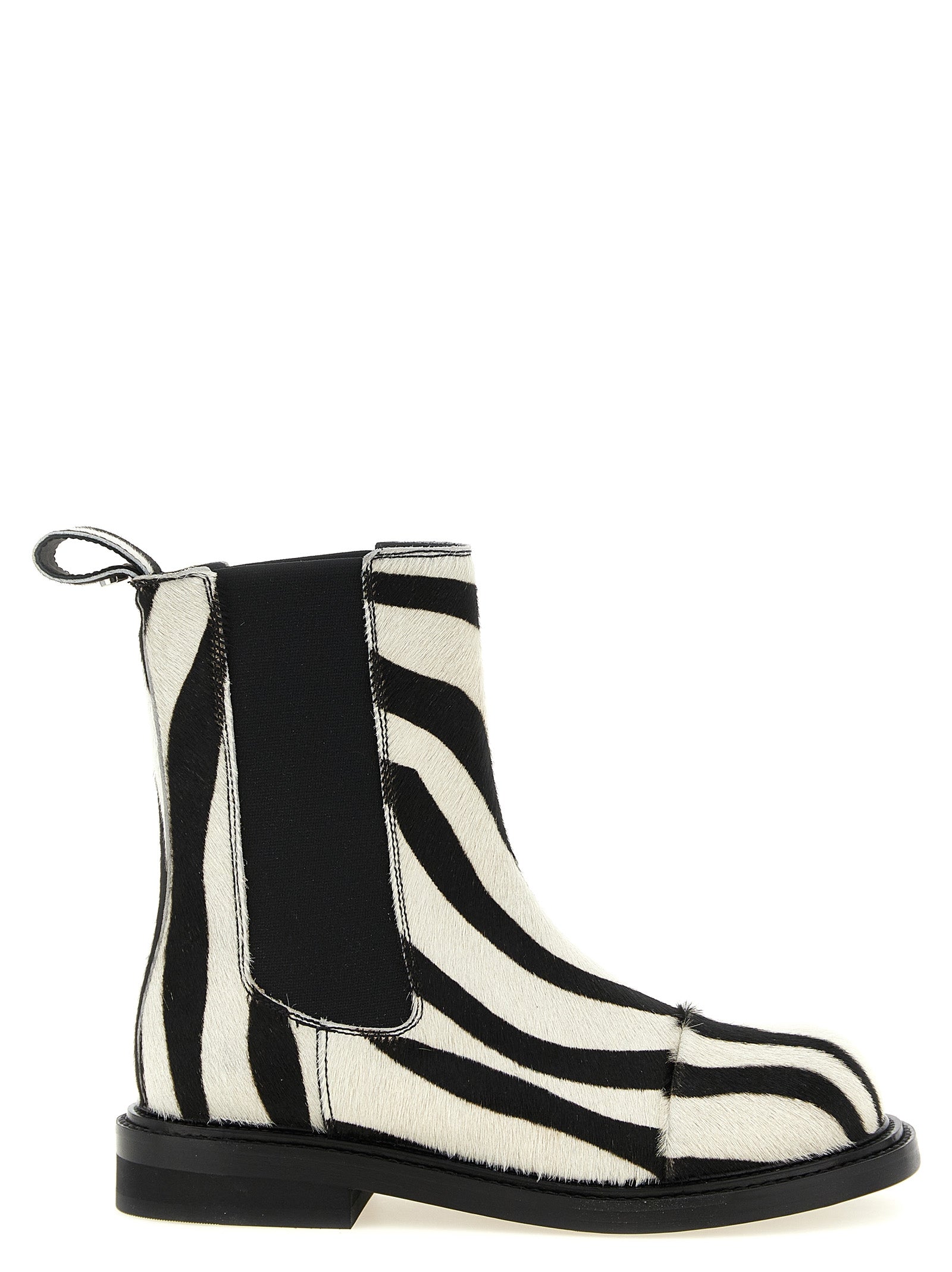 Flat Ankle Chelsea Boots by Moschino for women in calfskin leather bicolour, black, white, zebra & patterned features an high-performance silhouette, showcasing the sophisticated design of the Women's Calfskin Leather Flat Ankle Chelsea Boots with a flat and a refined .