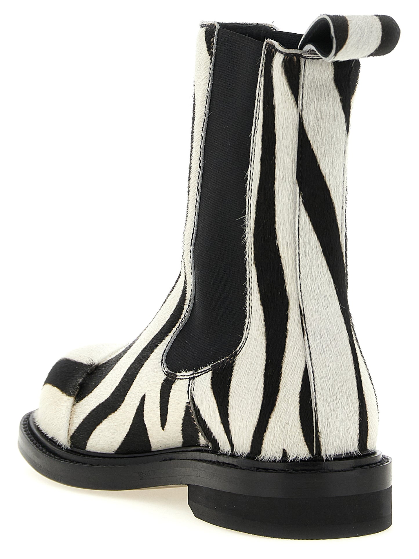 Flat Ankle Chelsea Boots by Moschino for women in calfskin leather bicolour, black, white, zebra & patterned features an avant-garde Women's Calfskin Leather Flat Ankle Chelsea Boots silhouette, defined by a sophisticated flat and a avant-garde .