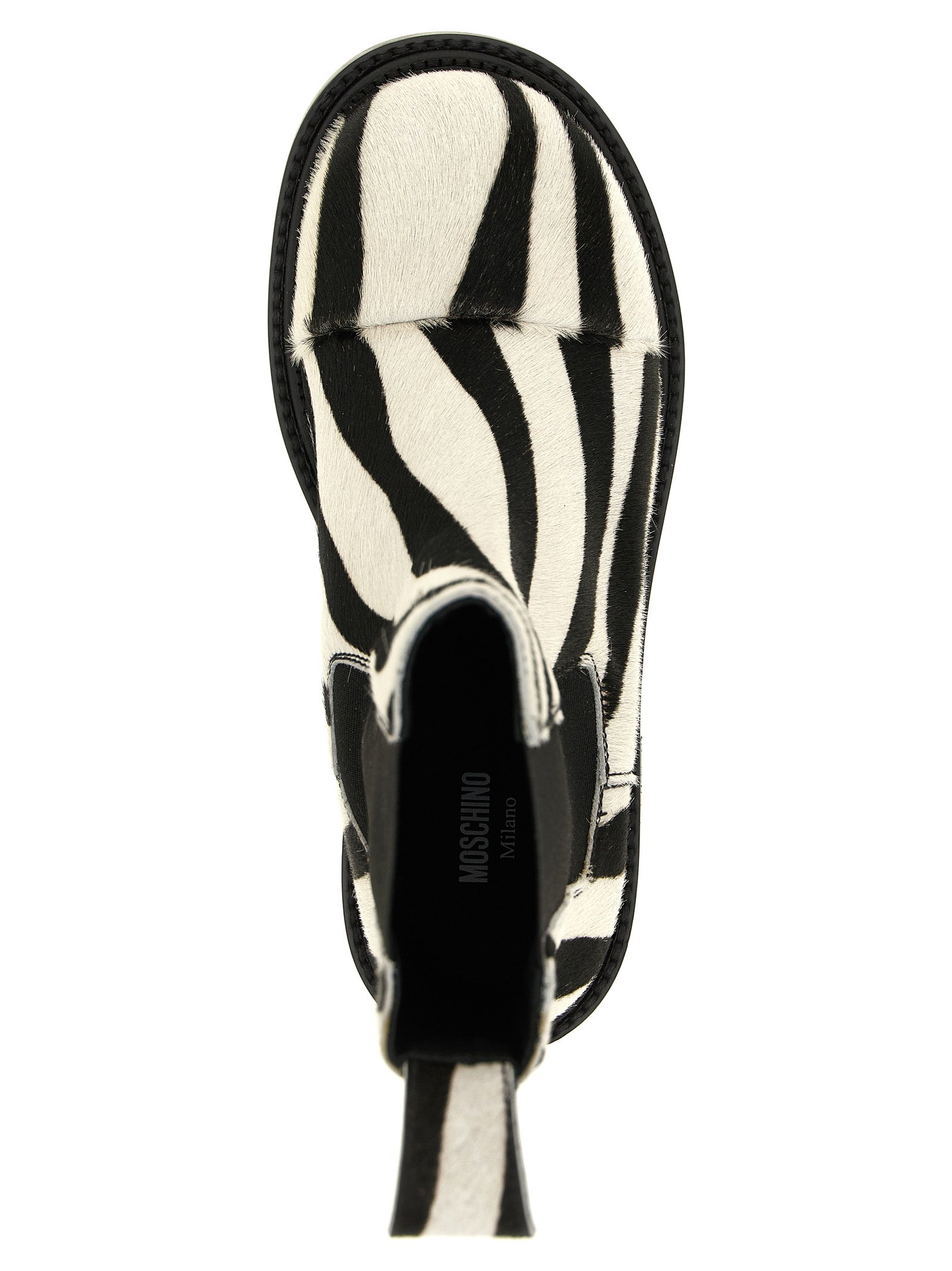 Flat Ankle Chelsea Boots by Moschino for women in calfskin leather bicolour, black, white, zebra & patterned features an enchanting design from the Women's Calfskin Leather Flat Ankle Chelsea Boots collection, highlighting a enchanting flat and for a refined look.