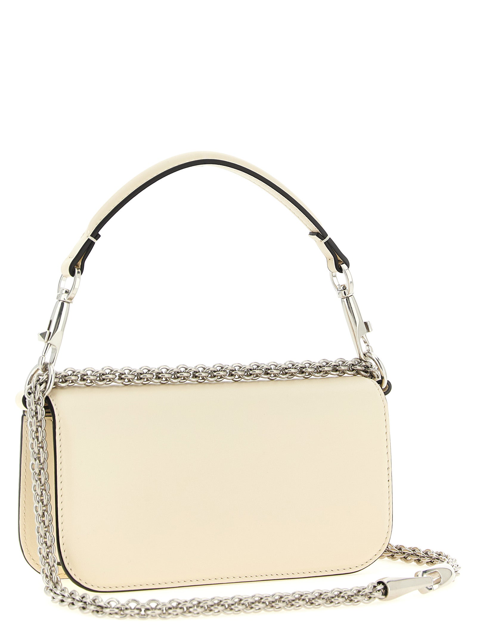 Small 2-in-1 Shoulder & Crossbody Flap Bag by Valentino Garavani for women in bos taurus suede calf leather white & signature features an effortlessly chic silhouette with a secure flap & magnetic, ample , and versatile crossbody-strap, shoulder-strap, detachable-strap & handle for effortlessly chic everyday luxury.