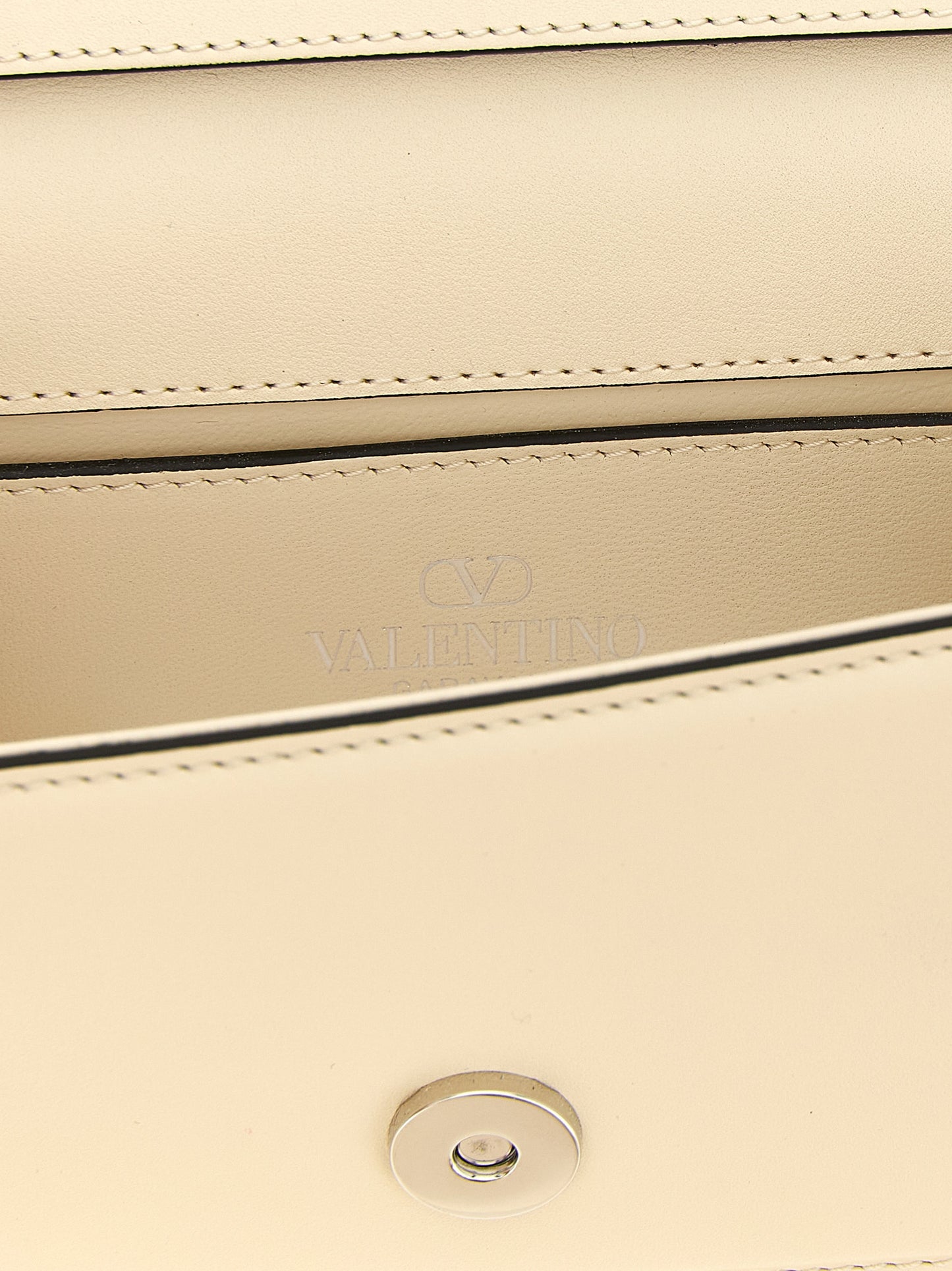 Small 2-in-1 Shoulder & Crossbody Flap Bag by Valentino Garavani for women in bos taurus suede calf leather white & signature showcases a enviable silhouette, artfully detailed with a secure flap & magnetic, organized , and versatile crossbody-strap, shoulder-strap, detachable-strap & handle for a enviable look.